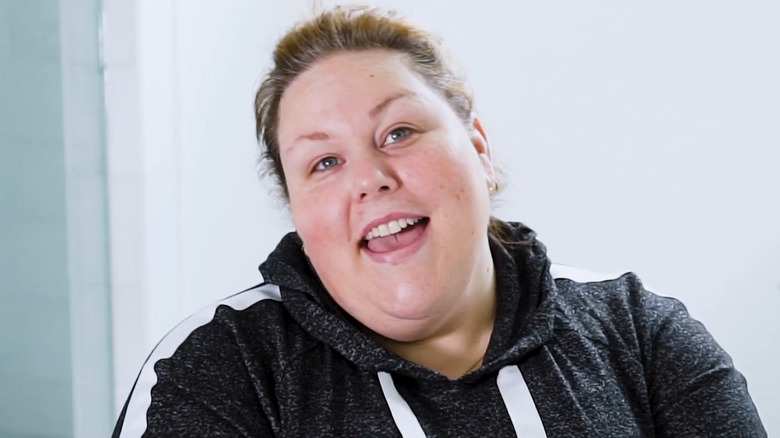 A makeup-free Chrissy Metz looks into the camera as she speaks.