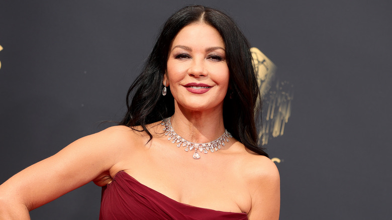Catherine Zeta-Jones smiling on red carpet