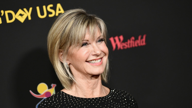 olivia newton-john smiling bangs