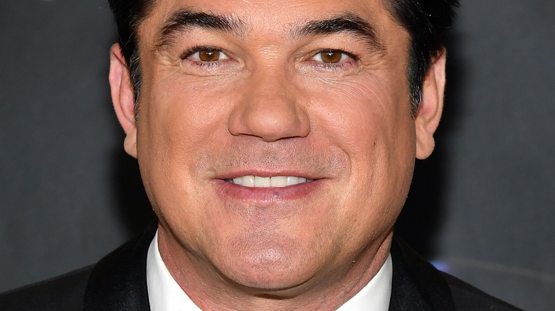 Dean Cain posing on the red carpet