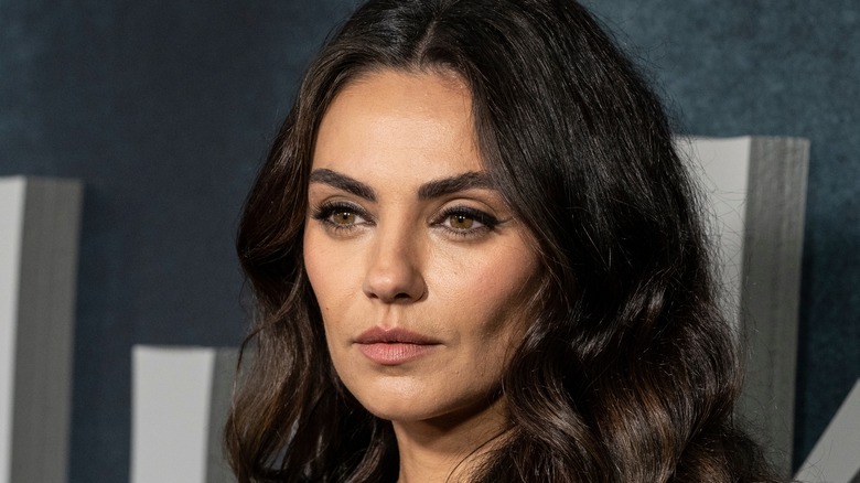 Mila Kunis posing on red carpet