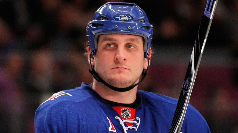 Derek Boogaard wearing hockey helmet