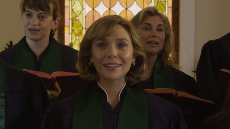 Elizabeth Olsen as Candy Montgomery singing