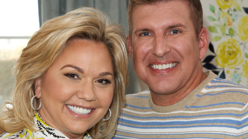 Julie Chrisley and Todd Chrisley pose together 