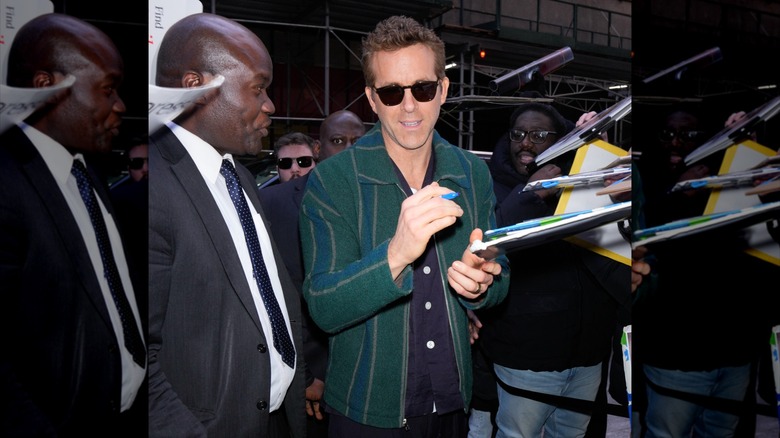 Ryan Reynolds signing autographs in New York City