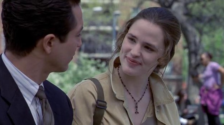 A young Jennifer Garner smiling at Benjamin Bratt