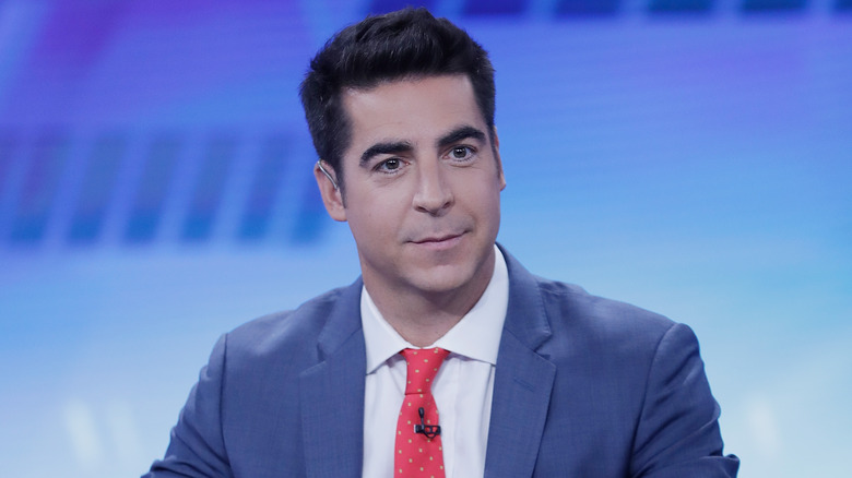 Jesse Watters wearing a suit