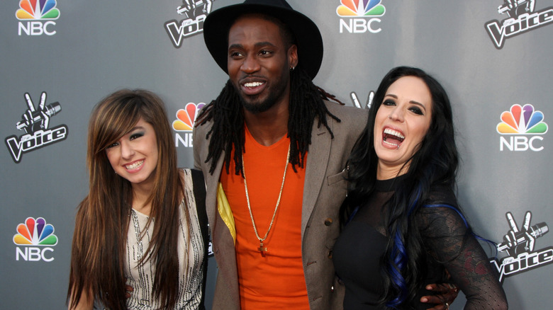 Christina Grimmie, Delvin Choice, and Kat Perkins pose together at a Season 6 "The Voice" event