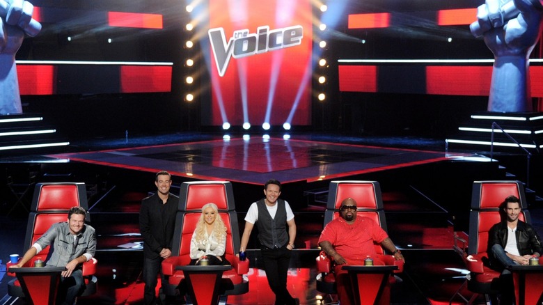 Judge Blake Shelton, Host Carson Daly, Judge Christina Aguilera, Judge Cee Lo Green, and Judge Adam Levine pose for a press photo for "The Voice"