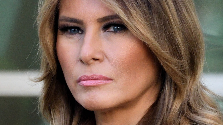 Melania Trump looking at camera with serious expression