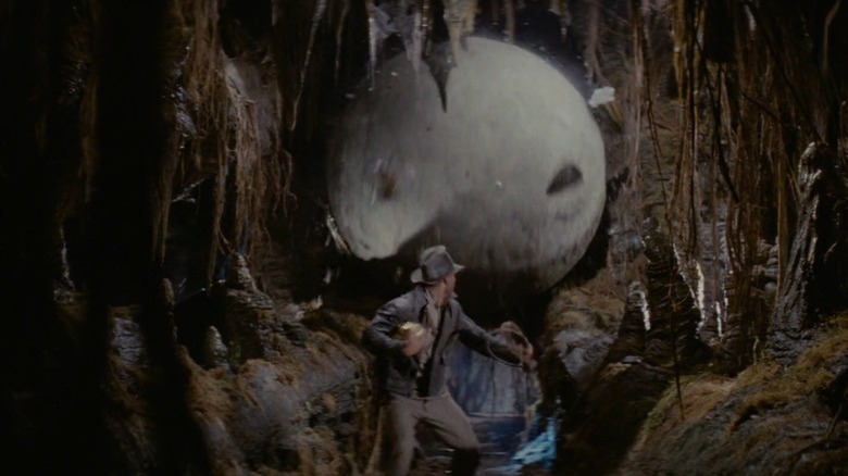Harrison Ford Indiana Jones running from boulder in Raiders of the Lost Ark