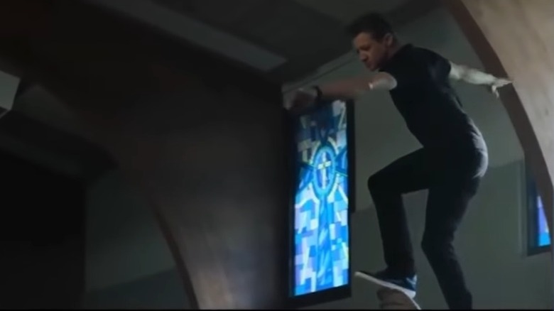 Jeremy Renner jumping off chairs in Tag