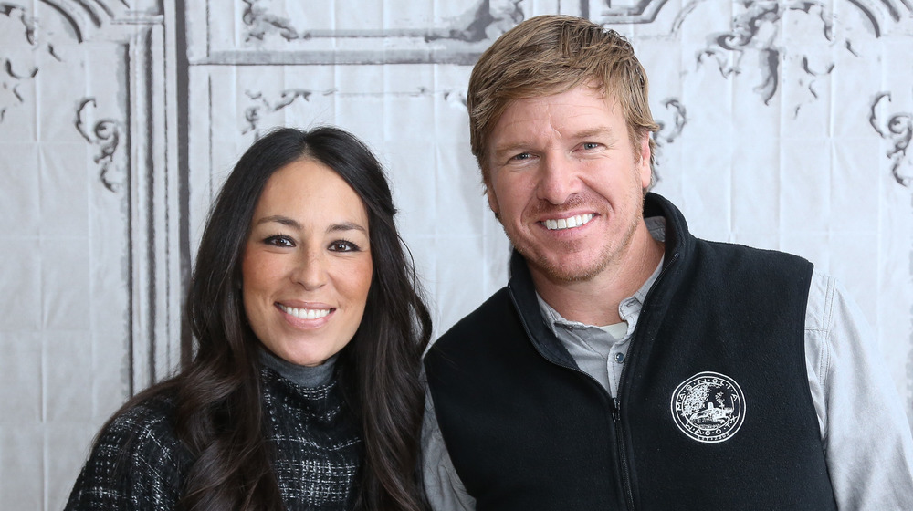 Chip and Joanna Gaines smiling 