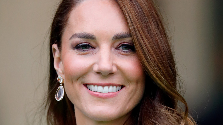 Kate Middleton smiling for photo