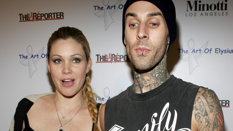 Travis Barker and Shanna Moakler posing