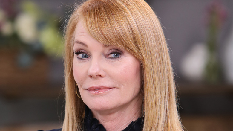 Marg Helgenberger looking to the side