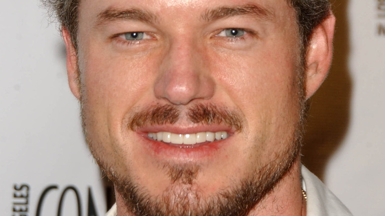 Eric Dane smiles on the red carpet