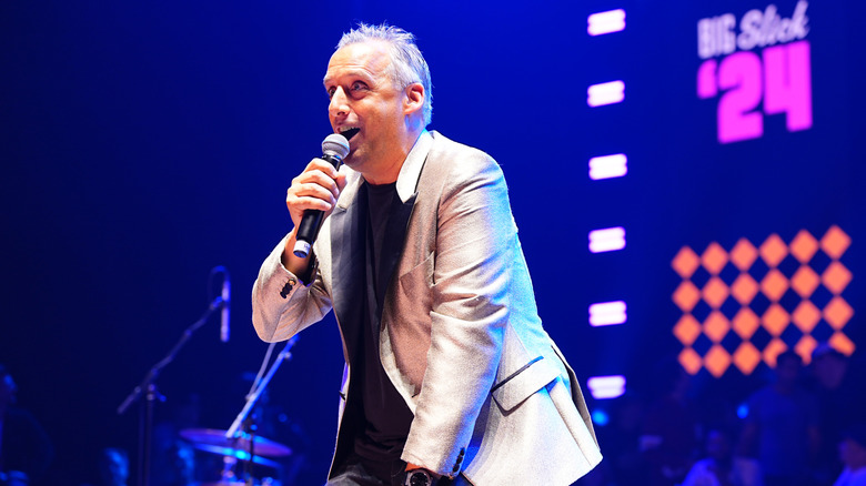 Joe Gatto performing standup comedy onstage