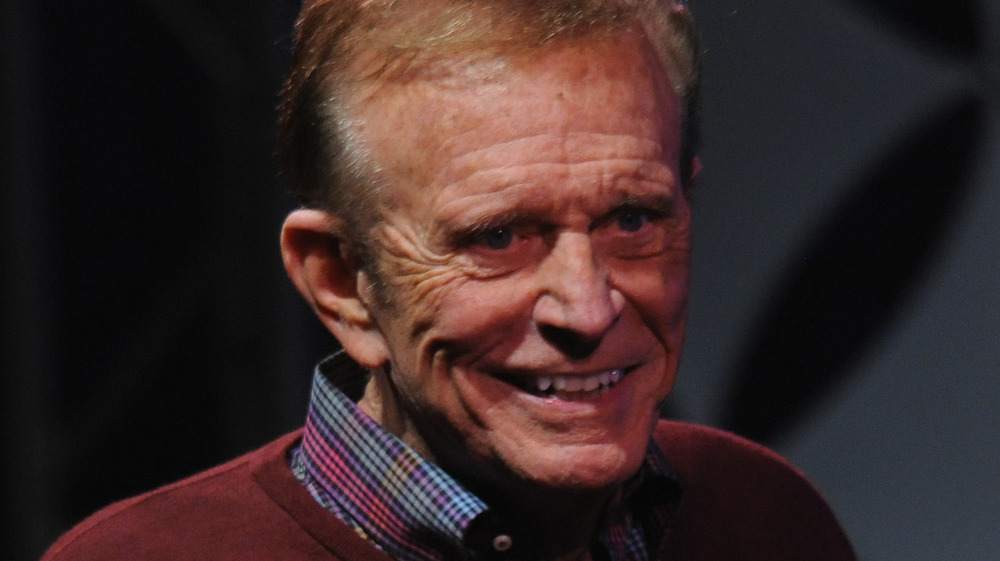 Bob Eubanks on stage, smiling