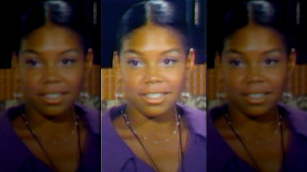 Cheryl Brown smiling during a TV interview 
