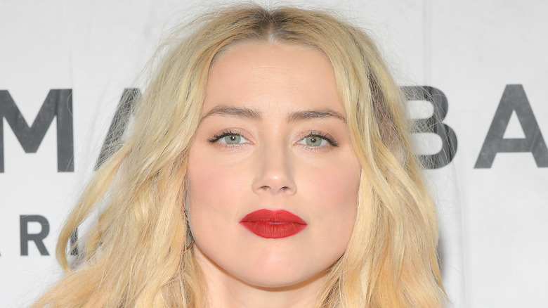 Amber Heard looking at camera