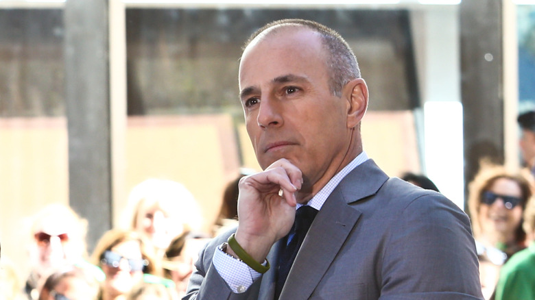Matt Lauer with hand on his chin