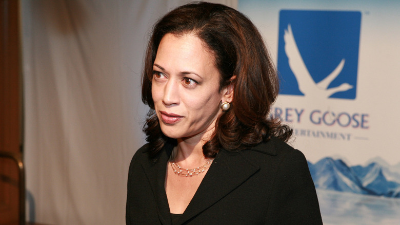Kamala Harris looks on