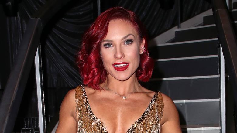 Sharna Burgess poses on staircase