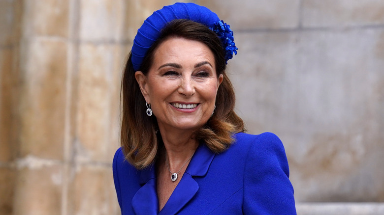 Carole Middleton smiling in blue