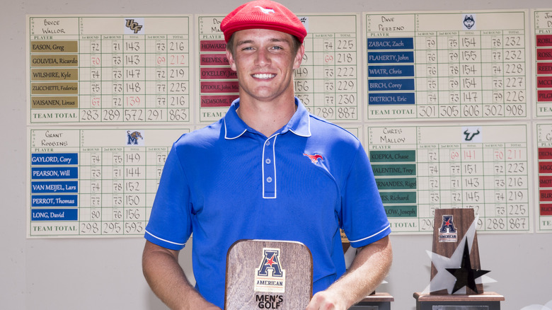 Bryson DeChambeau in red cap