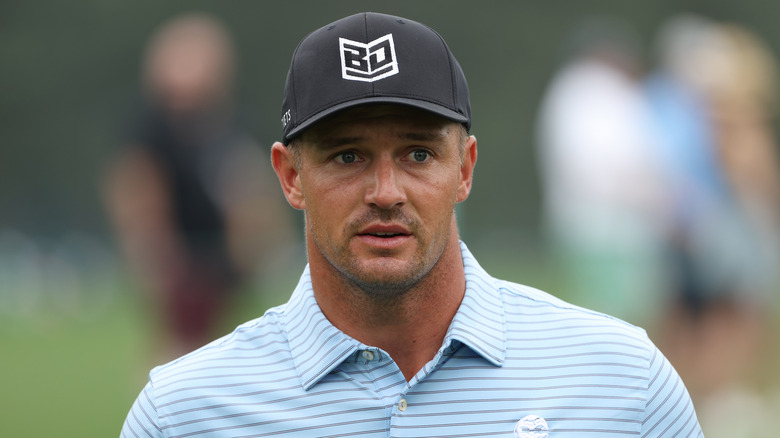 Bryson DeChambeau in black shirt