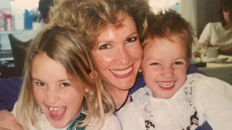 Paige Spiranac with her mother and sister