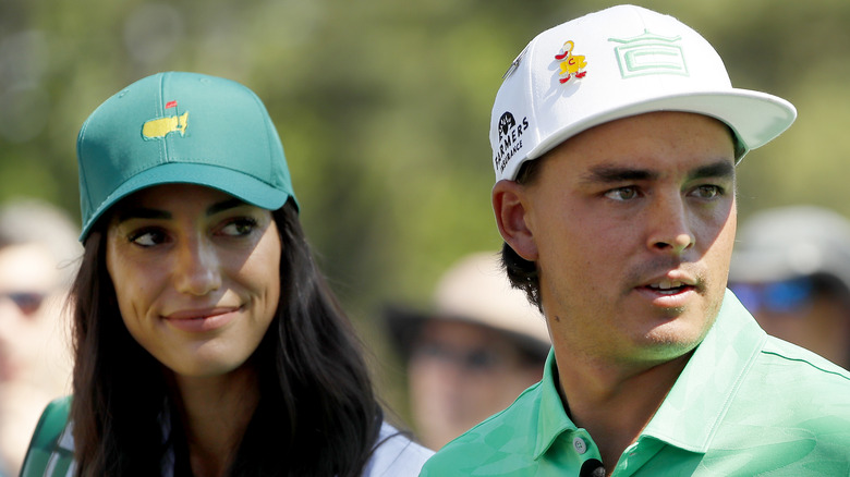 Rickie Fowler and Allison Stokke on the golf course