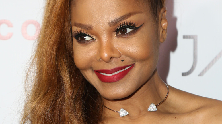 Janet Jackson smiling on the red carpet 
