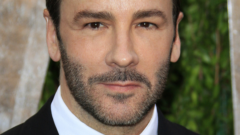 Tom Ford poses in a tux