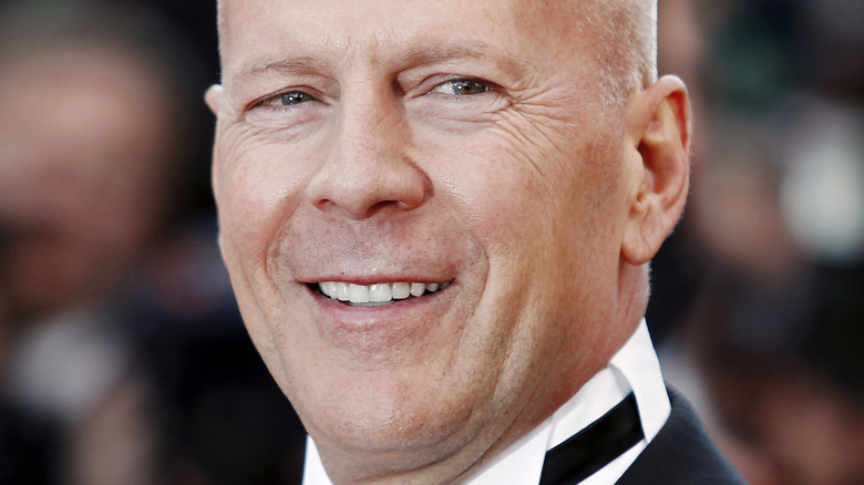 Bruce Willis smiling at the "Moonrise Kingdom" premiere