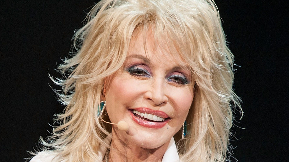 Dolly Parton performing on stage 