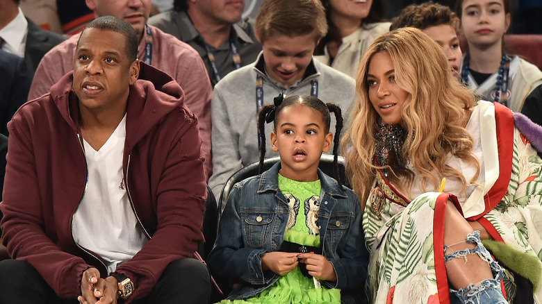 Beyonce, Jay Z, Blue Ivy, Rumi, and Sir Carter dressed as "The Proud Family"