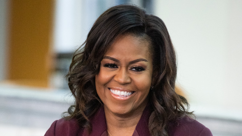 Michelle Obama smiles