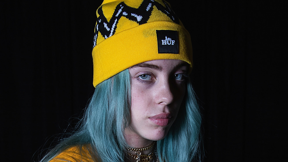 Billie Eilish wears a beanie