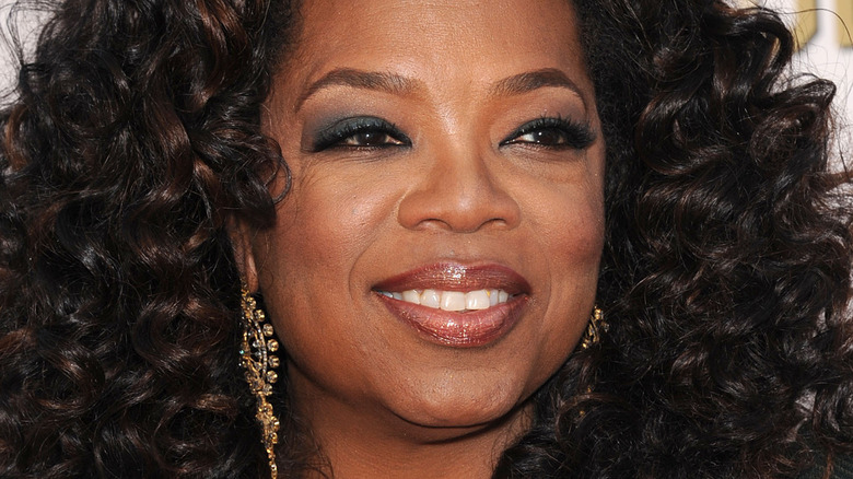 Oprah Winfrey poses at an event