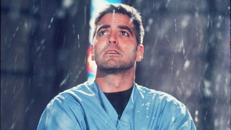 George Clooney outside in the rain in an ER scene.