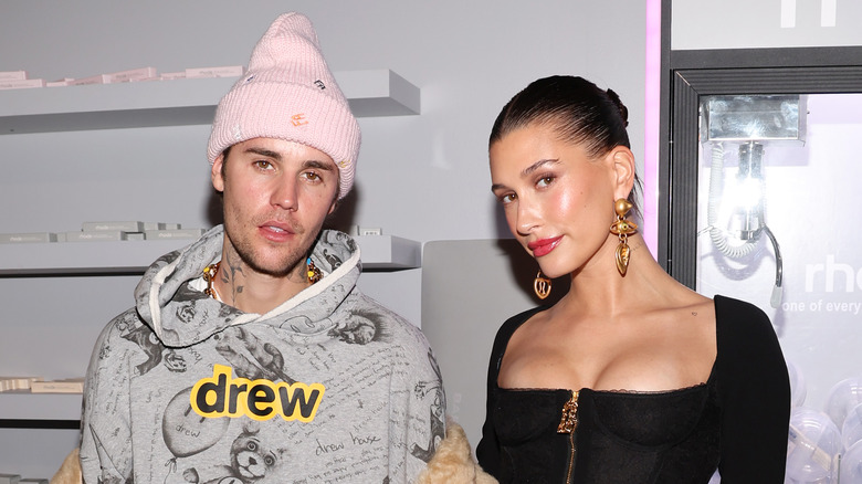 Justin and Hailey Bieber posing