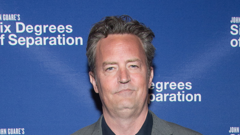 Matthew Perry gray suit