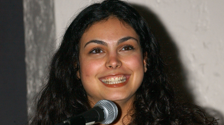 Morena Baccarin smiling at a press conference