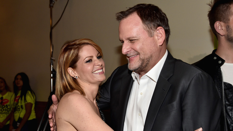 Candace Cameron Bure and Dave Coulier pose