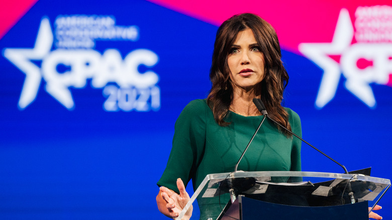 Kristi Noem on stage in 2021
