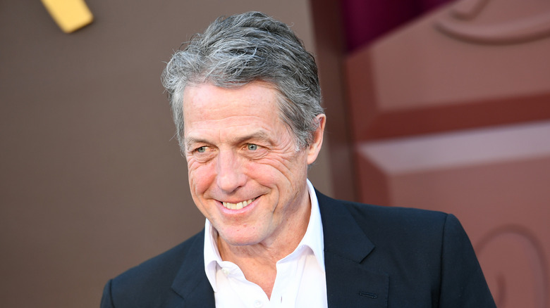 Hugh Grant smiling