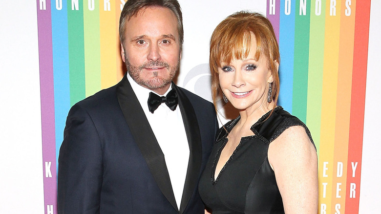Reba McEntire and Narvel Blackstock posing