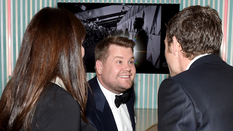 Anjelica Huston, James Corden and James Jagger attend the 2018 Vanity Fair Oscar Party.